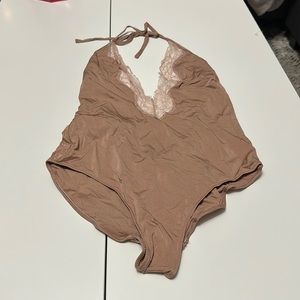 Nude lingerie bodysuit